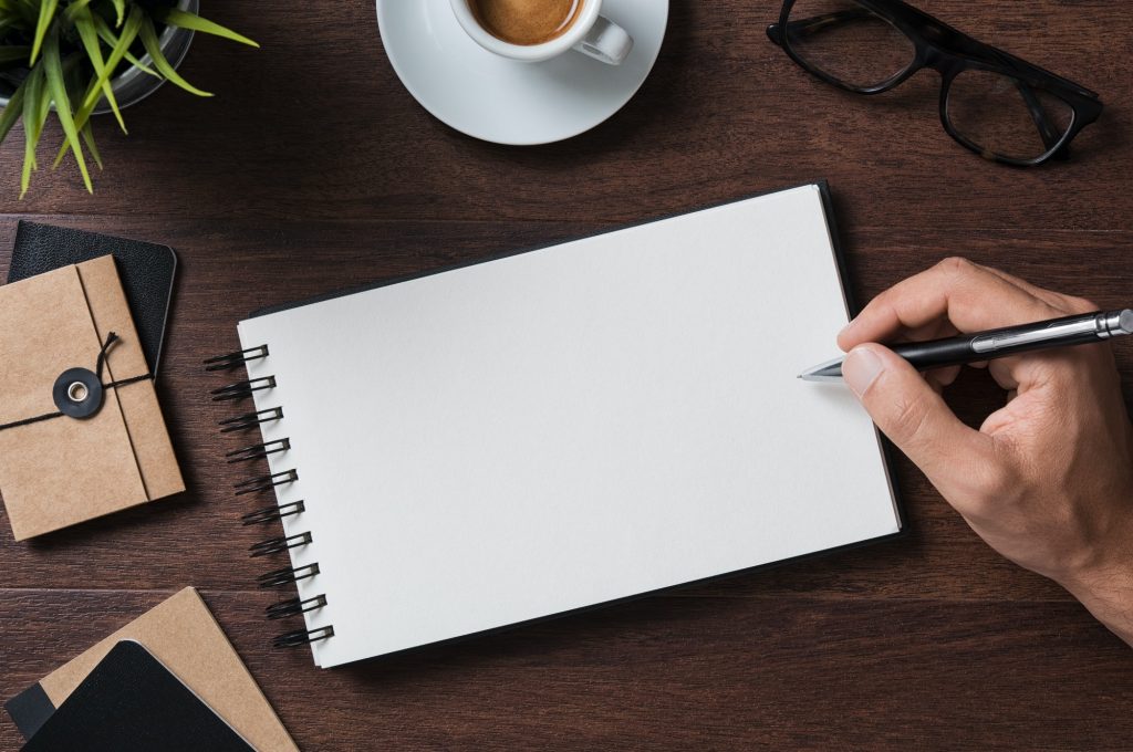 Hand writing on notepad