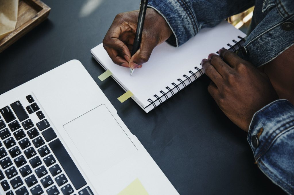 Man writing notes